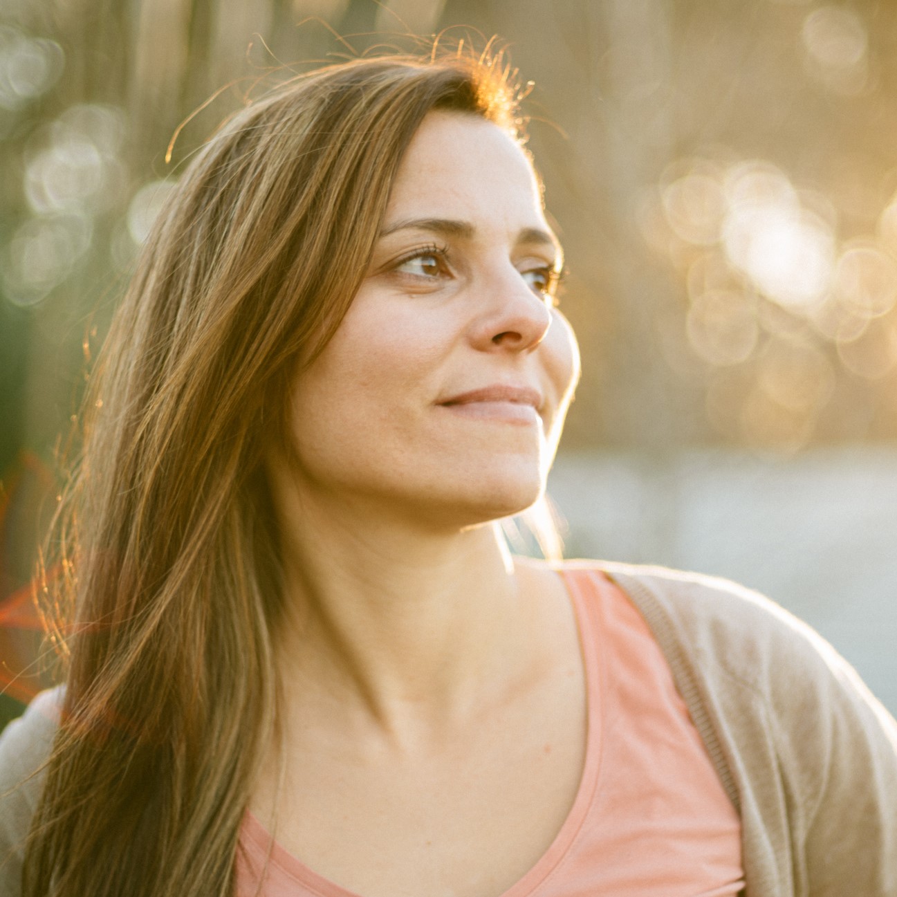 Person looking off in distance with a smile